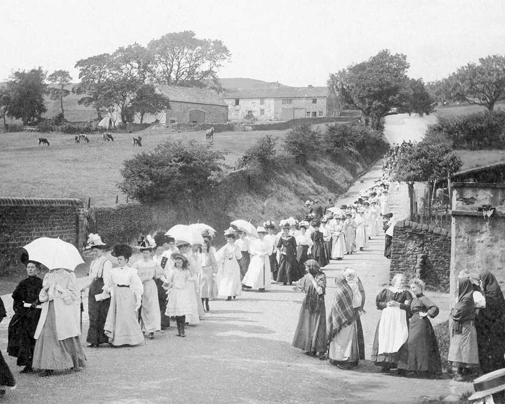 Women Dressed Up Marching in Sabden